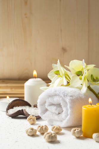 A serene spa setup at a unisex salon creates a calm and relaxing ambiance.